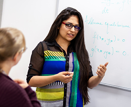 Academic talking to student